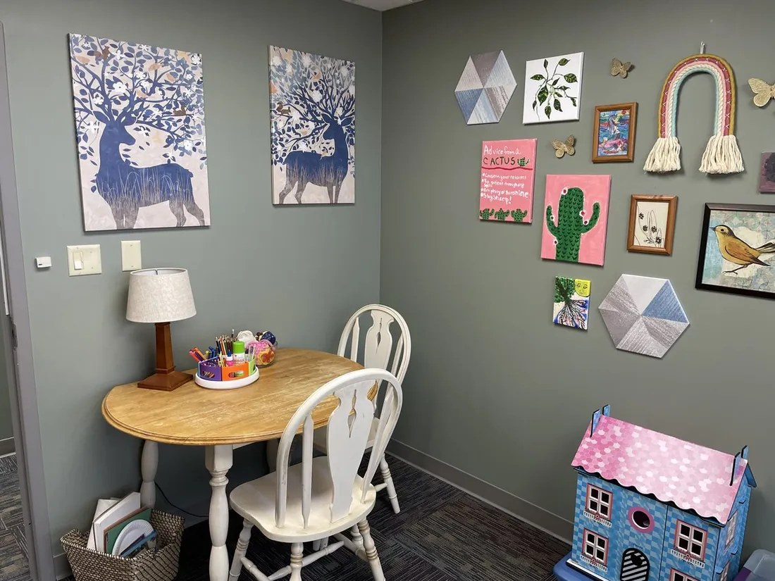 Cozy corner of the office with seating and warm decor