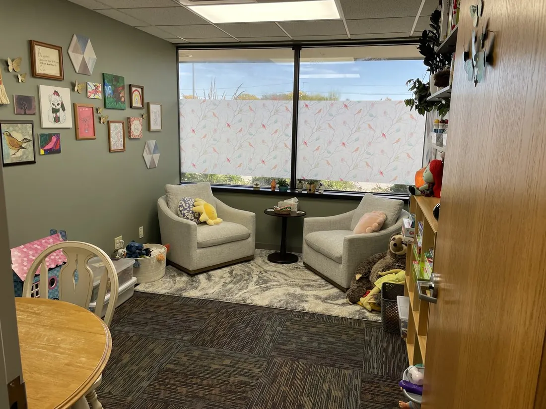 Therapy office with a sofa and soft, comfortable seating