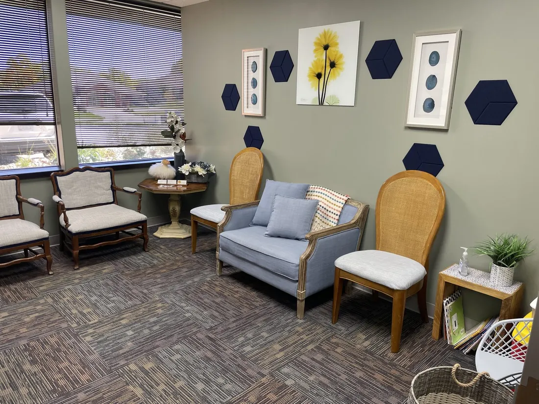 Waiting area seating with warm decor